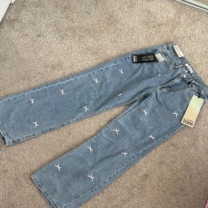 Blue jeans with pink bows